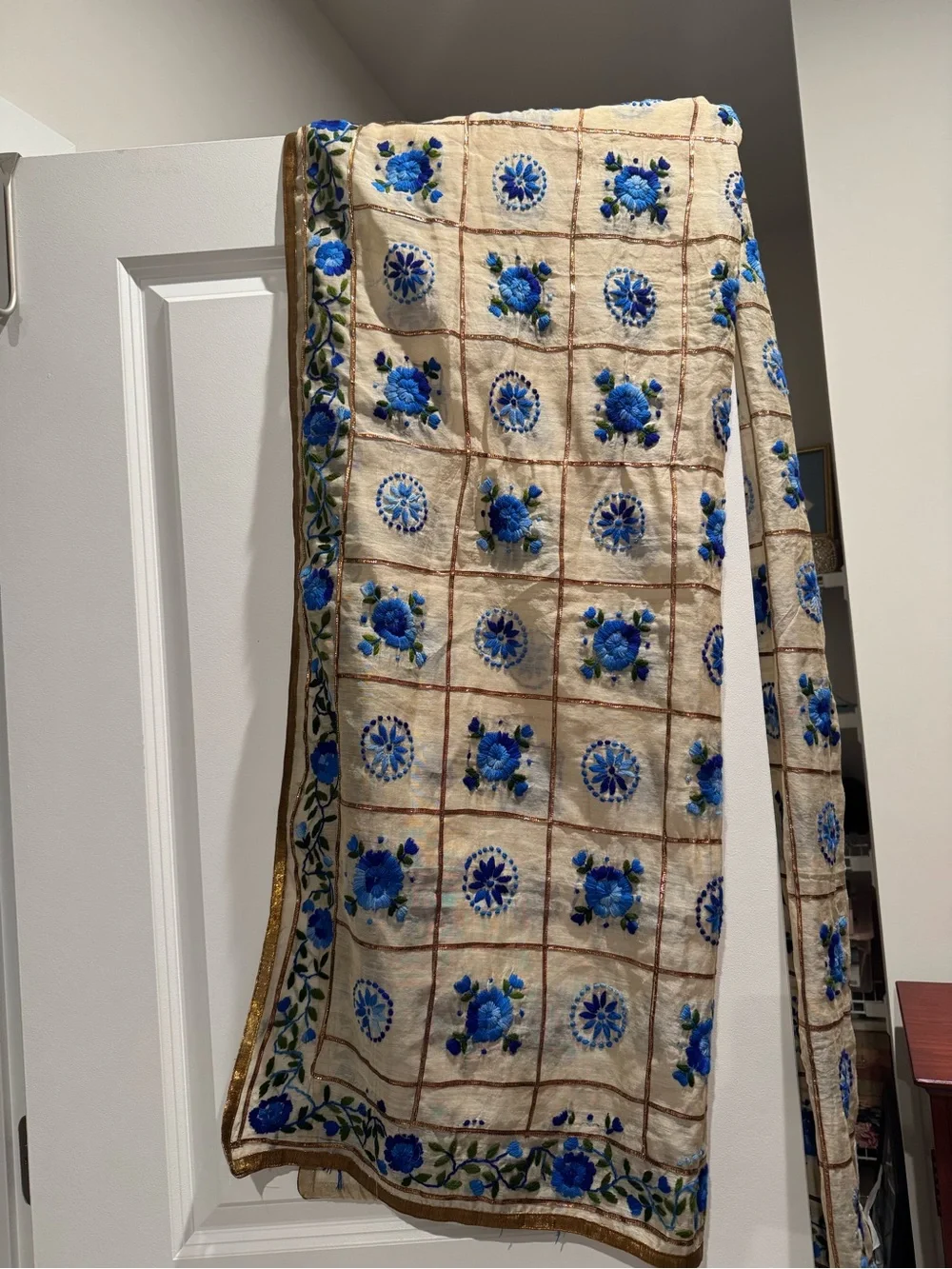 Embroidered Blue Floral Scarf on Cream Background